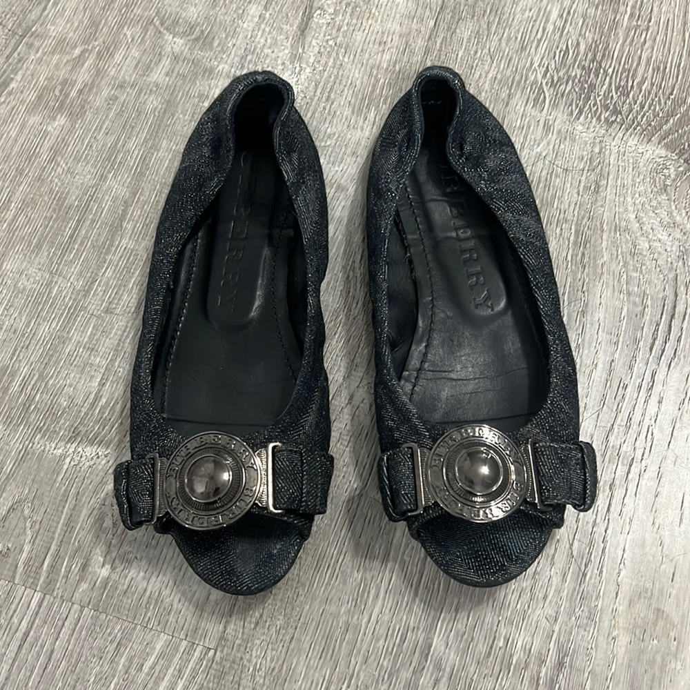 Burberry open toes shoes.